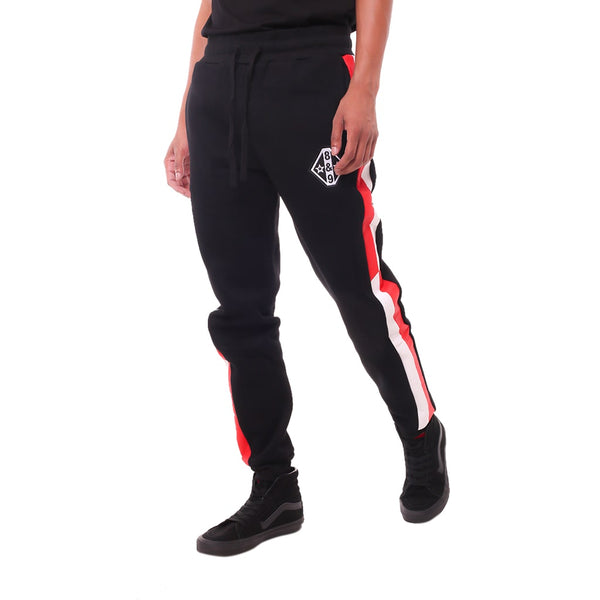 black joggers with red and white stripe