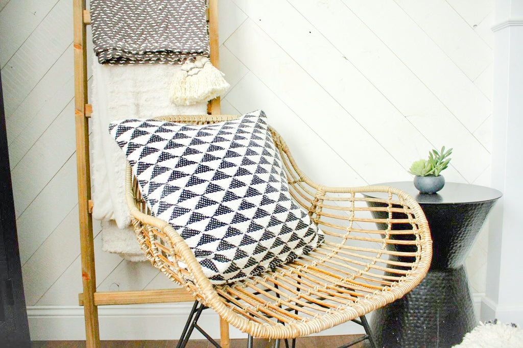 This bamboo rattan chair and blanket ladder really enhance the <a href=