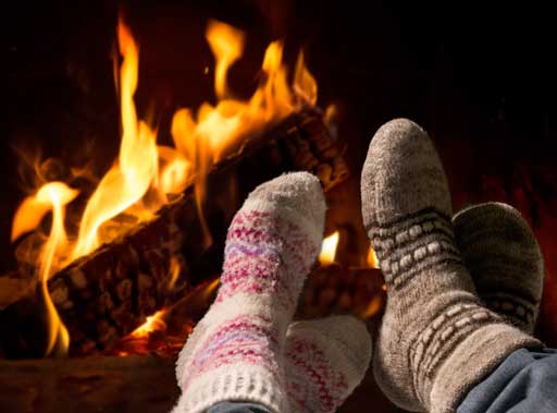 Couple with socks on in front of fire, cold weather, hot sex, ready for bunnyjuice