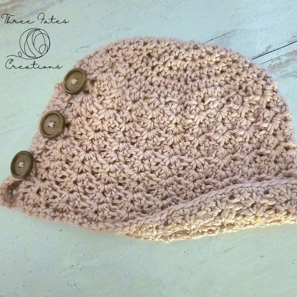 Damia Cloche - a crocheted hat with buttons