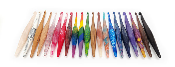 a linup of Furls streamline wood and resin crochet hooks