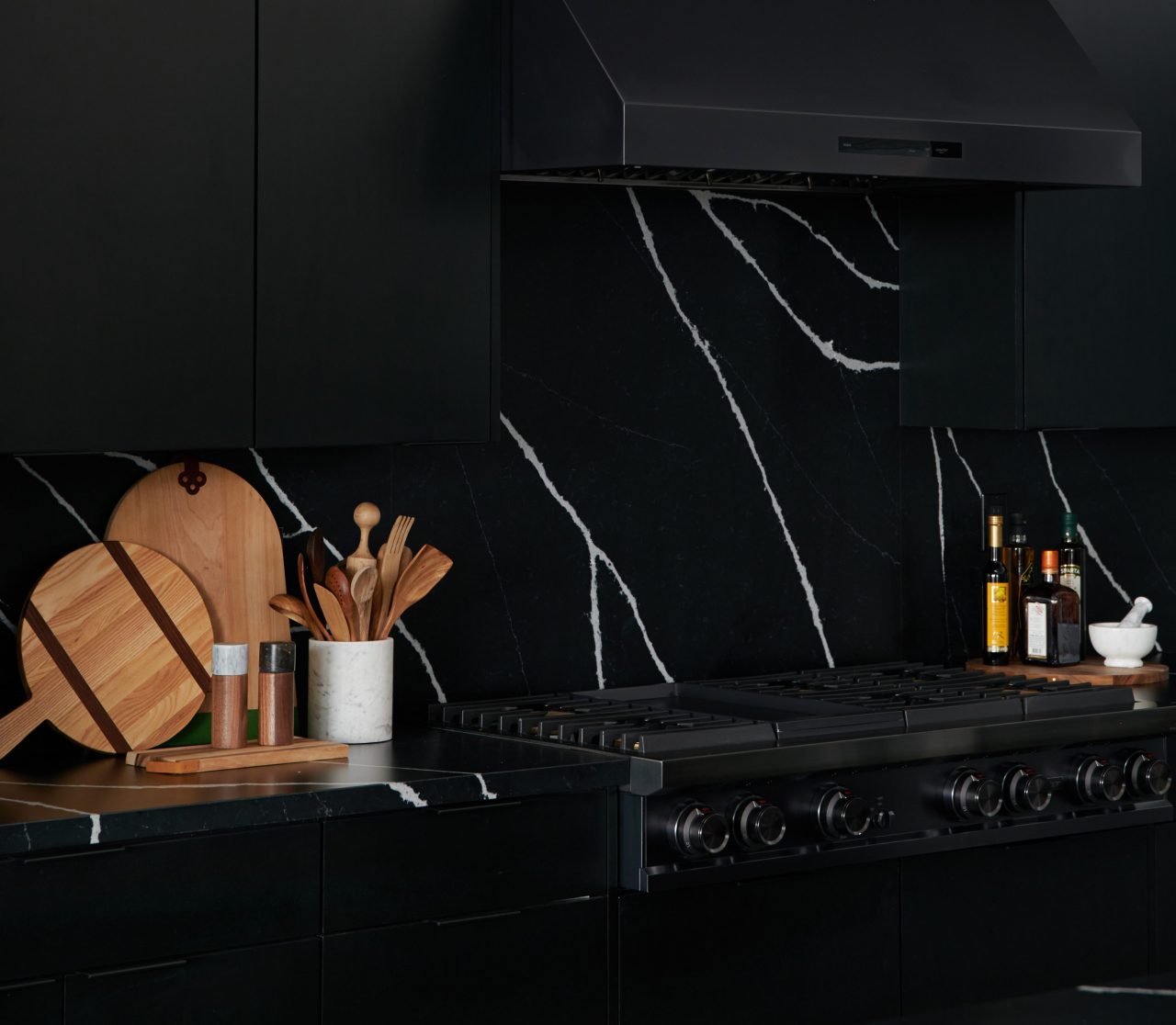 black on black marble kitchen