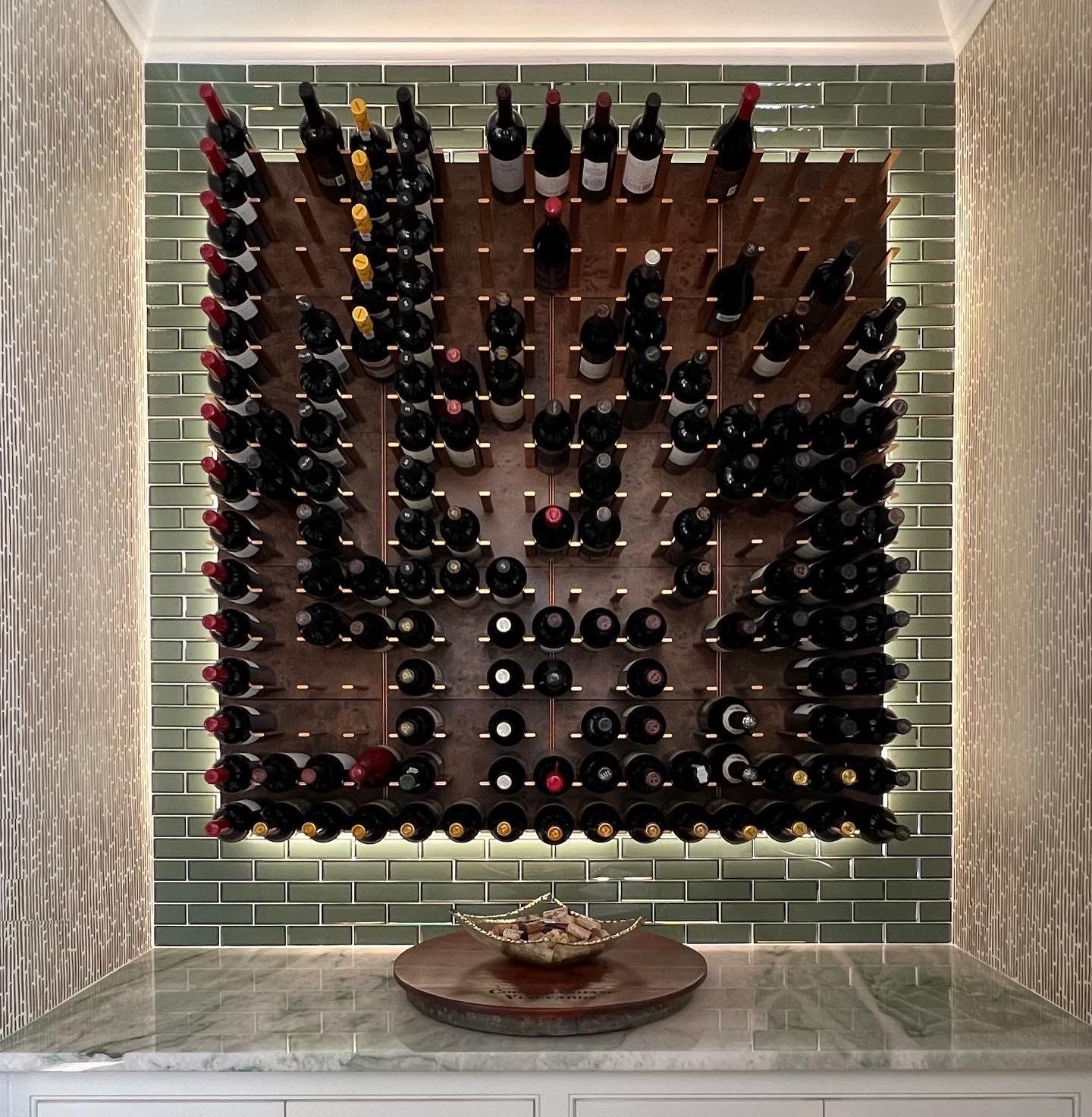 burled wood and gold luxury wine display