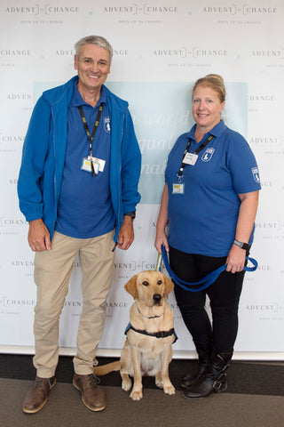 Petra the guide dog puppy and her handlers from Guide Dogs for The Blind