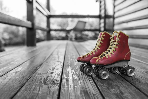 Roller skates on a wooden pier