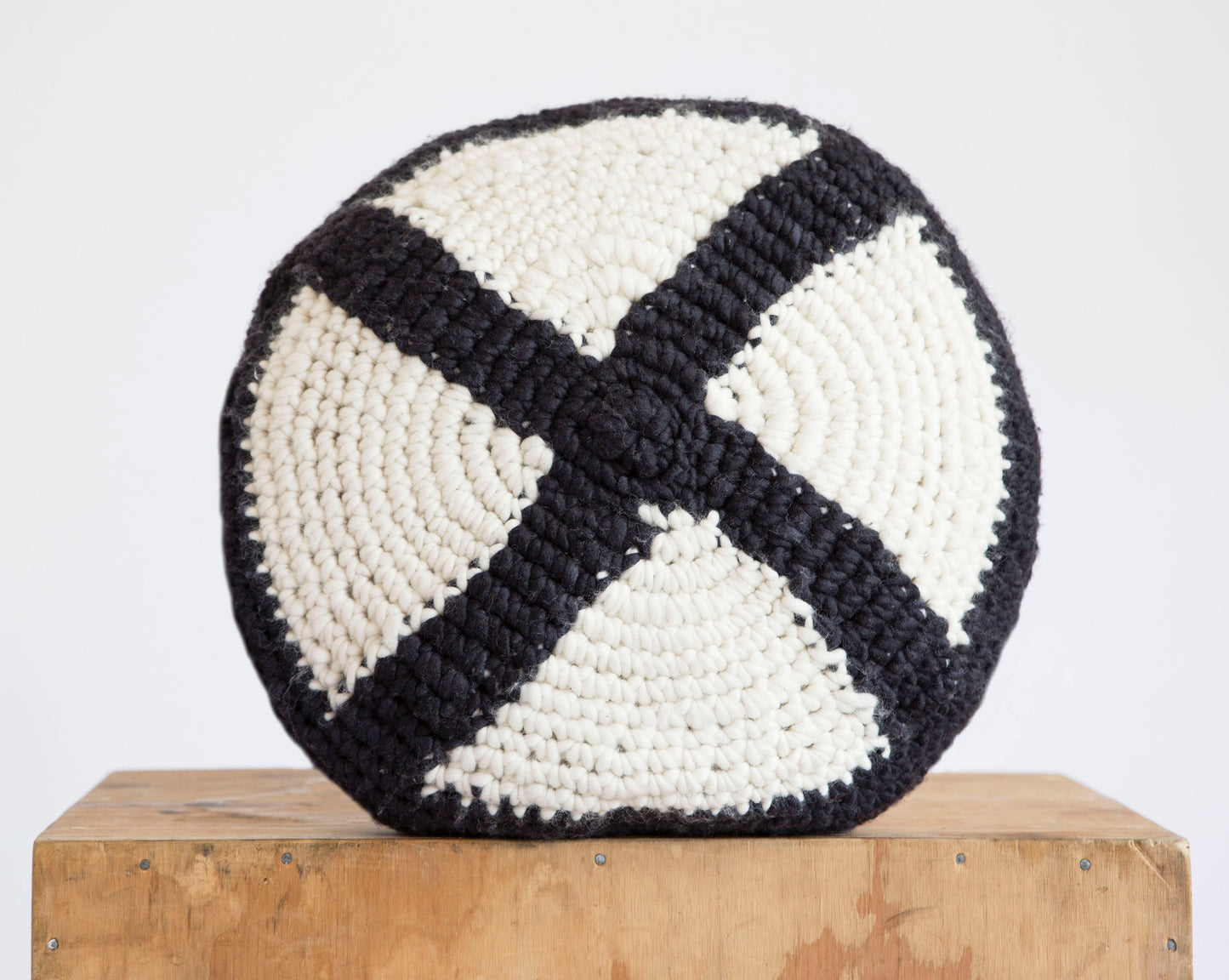 Round Crochet Cushion in Black & Natural wool Cosmo Tierra
