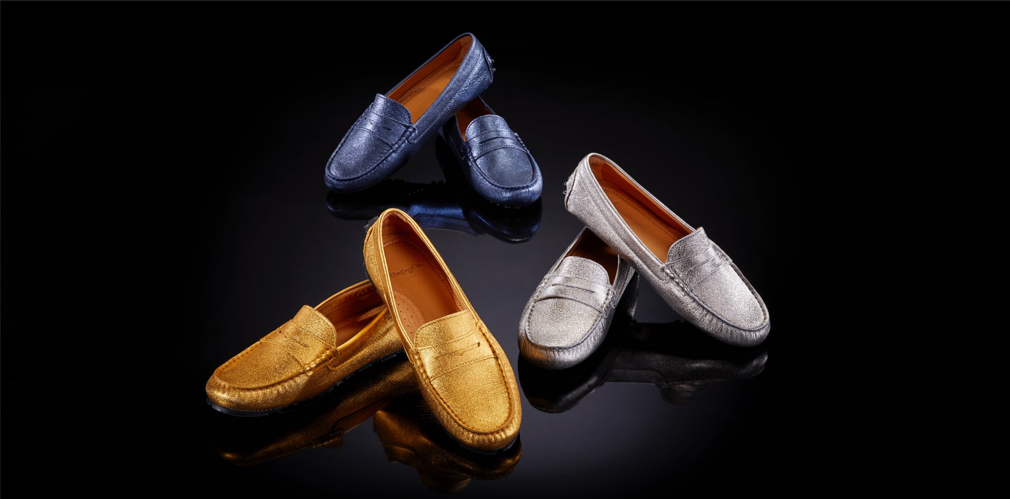 Hugs & Co. gold leather loafers