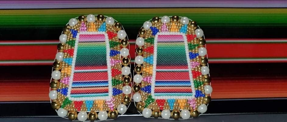 Oval-shaped-earrings-beaded-with-colorful-stripes-and-white-and-gold-beads