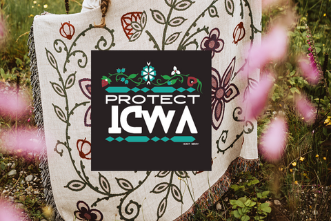 A white floral blanket with the text PROTECT ICWA over the top