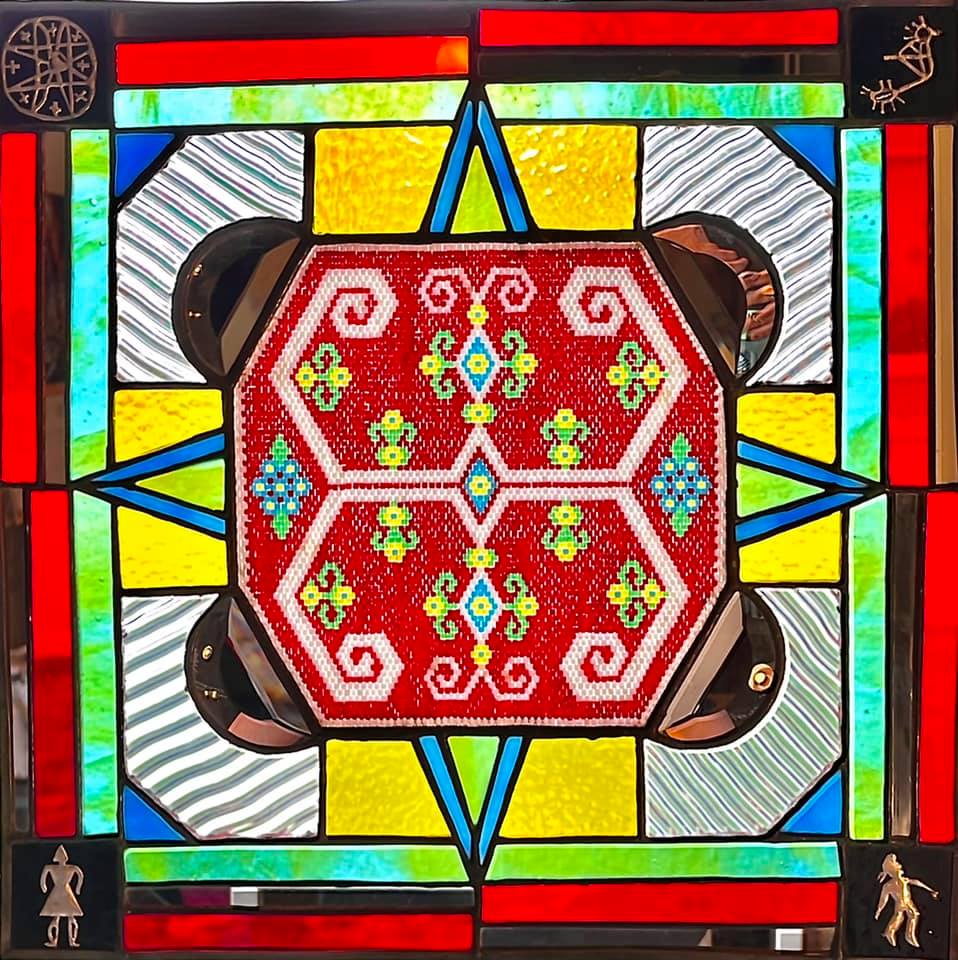 Stained-glass-and-beadword-composed-of-colorful-geometric-designs