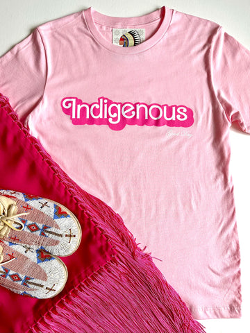 Baby Pink Tee in Barbie Font That Says "Indigenous"