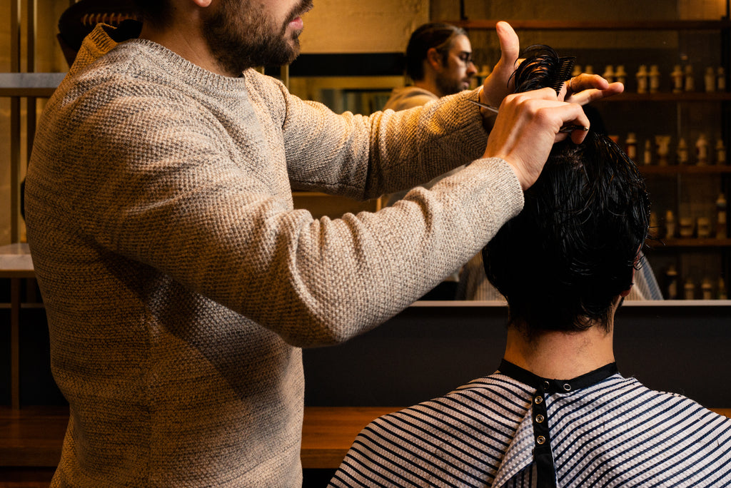 Craig Boa at Weekly Trim True cutting hair