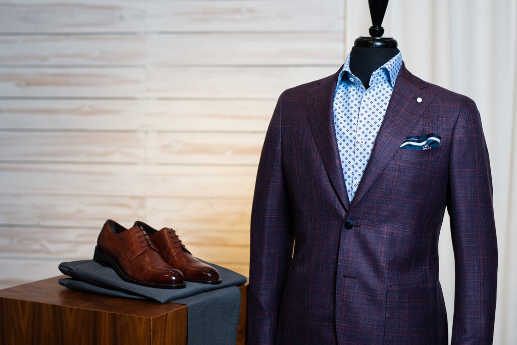Luigi Bianchi plum sport jacket worn with blue patterned dress shirt, grey trousers, and brown dress shoes