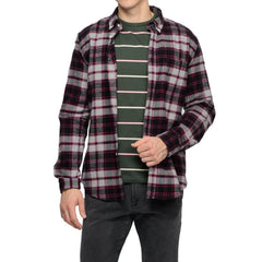 Plad Portuguese flannel shirt layered over green APC shirt