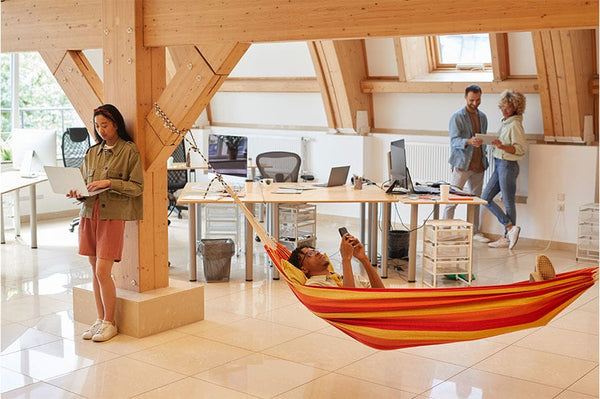 A co-worker relaxing in the hammock nook at the office.