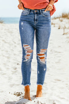 Distressed Fray Hem Skinny Jeans