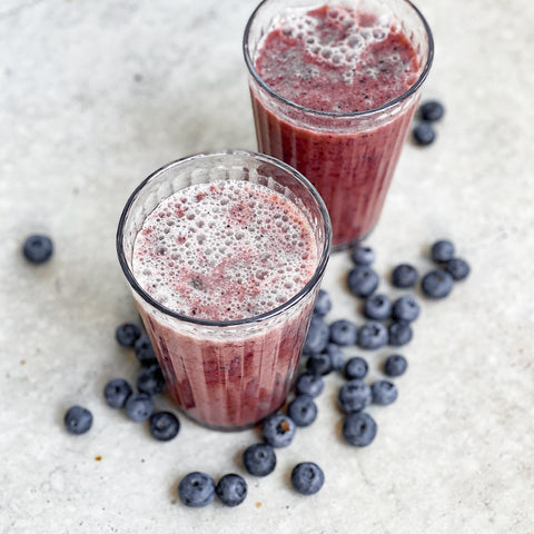 Two glasses of blueberry CBD smoothie