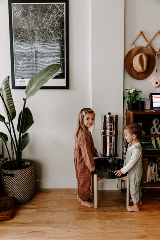 Two children with a Berkey filter