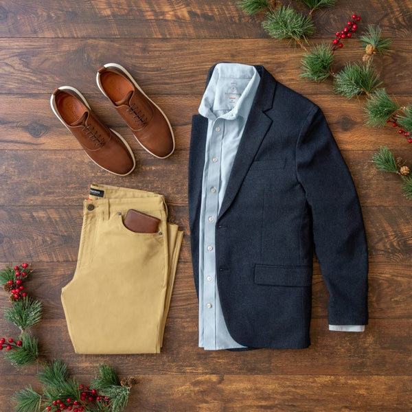 Men's holiday laydown image showing blue Gramercy Blazer, Ascender 5 pocket pant and Lenox Dress Shirt