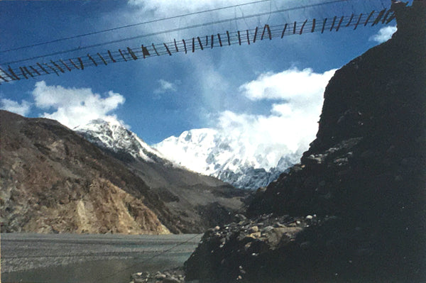 The same bridge in Northern Pakistan, from a different perspective that shows how high up it is.