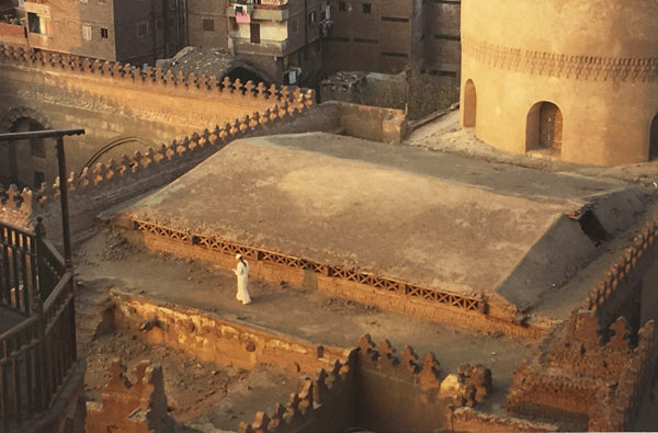 Man walking in Cairo during the late afternoon.
