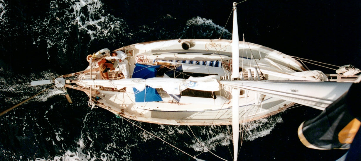 An overhead view of Slow Shoes, the sailboat in the water.