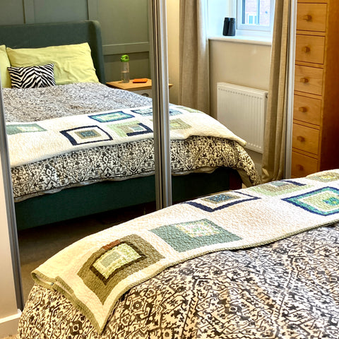 Bed in mirror closet doors