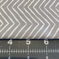 fabric with inch measurements on a quilting mat