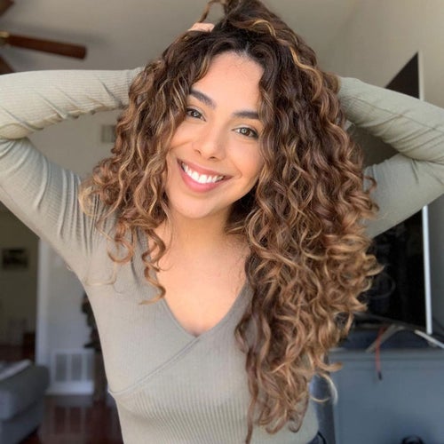 Naturally Curly hair with blonde balayage Hair by Sandy Turner  Shine  Hairstylists Kaiap  Hairdos for curly hair Dark blonde hair Blonde hair  with highlights