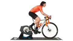 Woman riding a bicycle on an indoor trainer