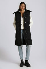 Black long puffer vest with hood by Avec Les Filles