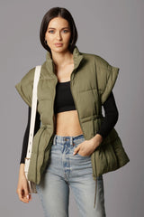 olive green puffer vest with cinched waist fitted figure flattering by Avec Les Filles