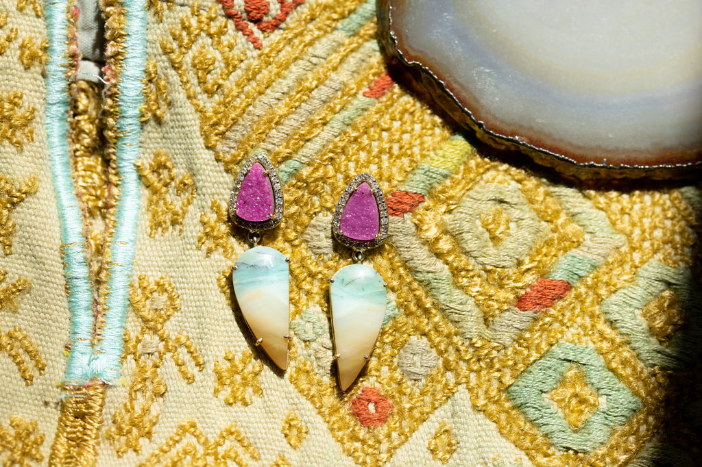 Earrings on a textured background