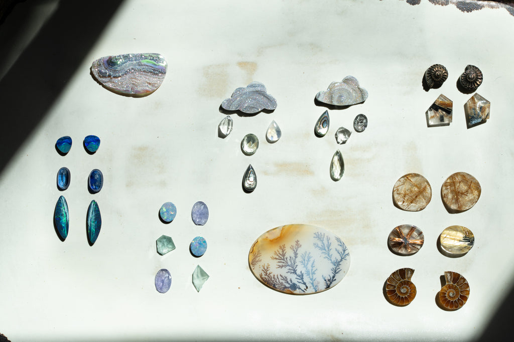 gems arranged on a ceramic dish in the sunlight