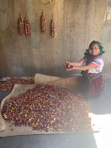 Mecican women with dried flowers