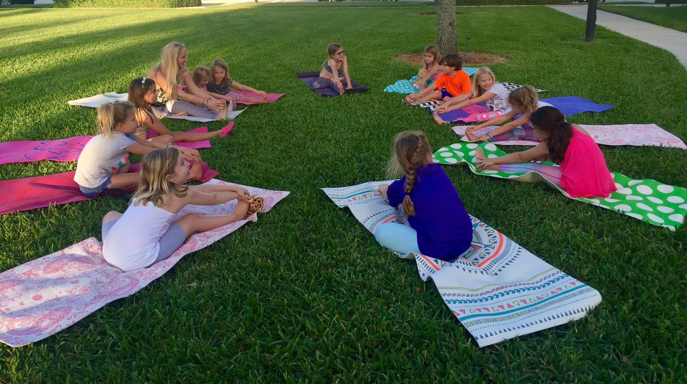 Meddy Teddy teaching a Kid's yoga class