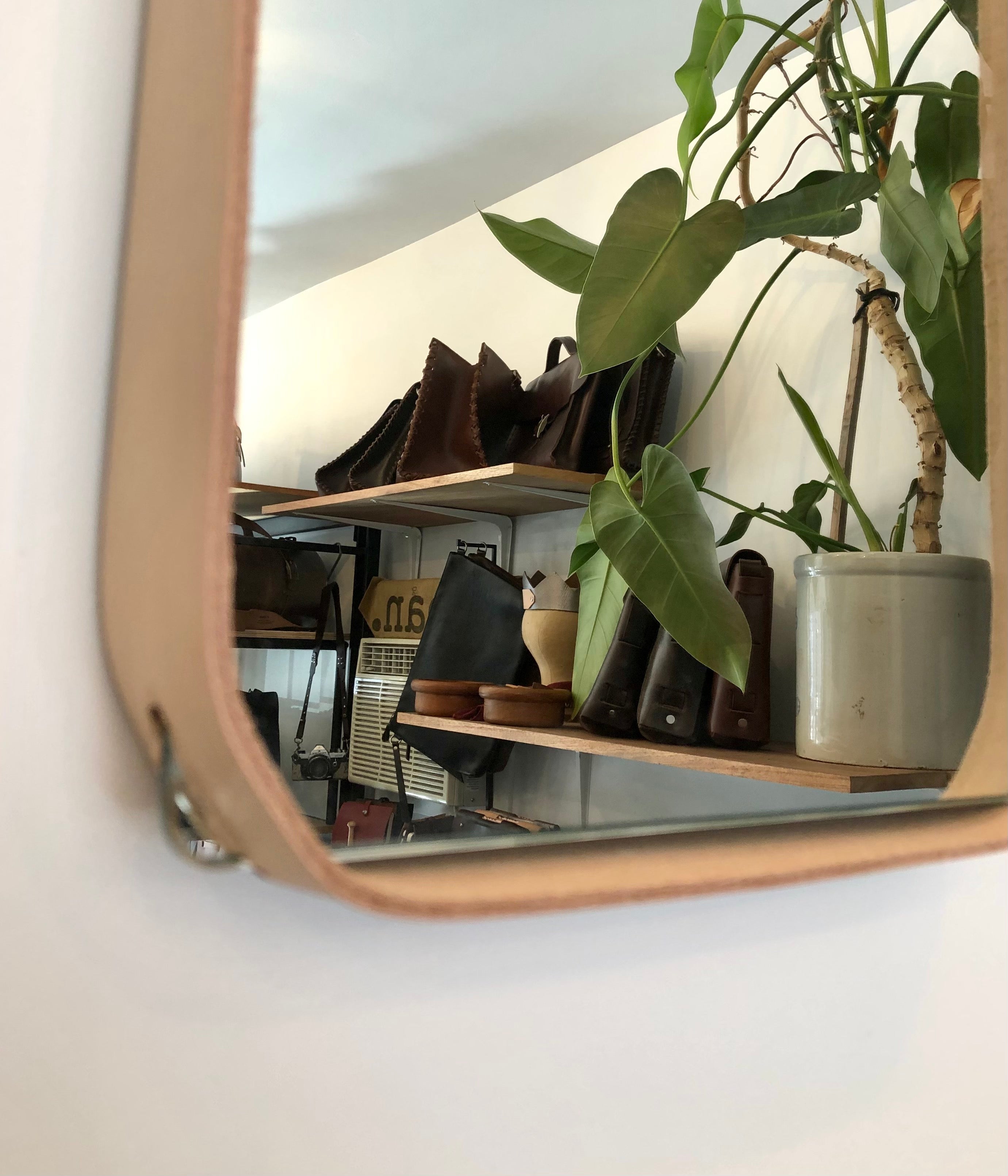 Leather framed mirror