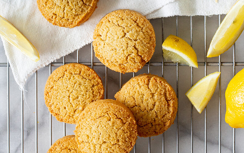 PBH Foods Keto Lemon Coconut Cookies on a cooling rack