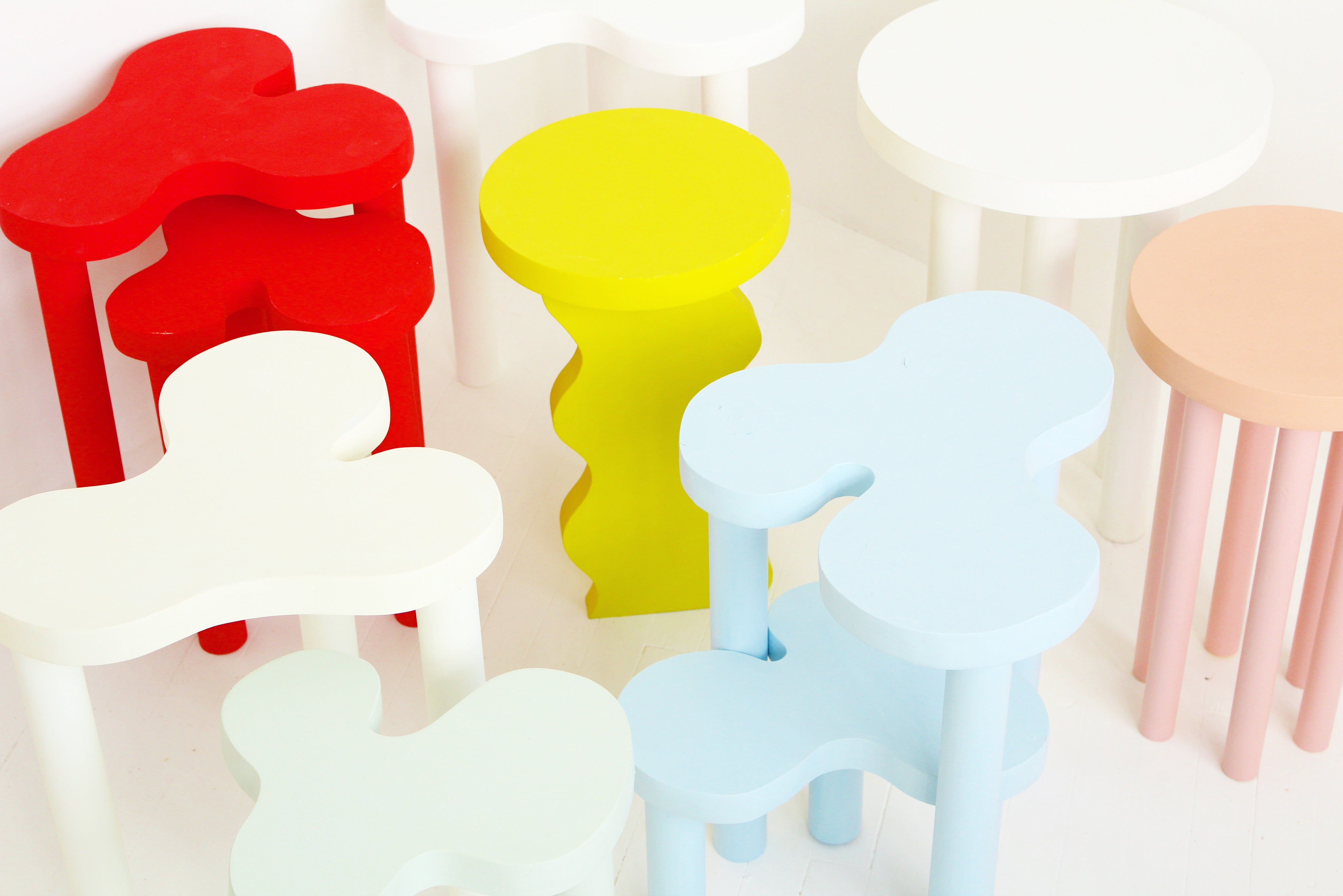 A group of Splat Side Tables in various colors, designed by Sophie Collé.