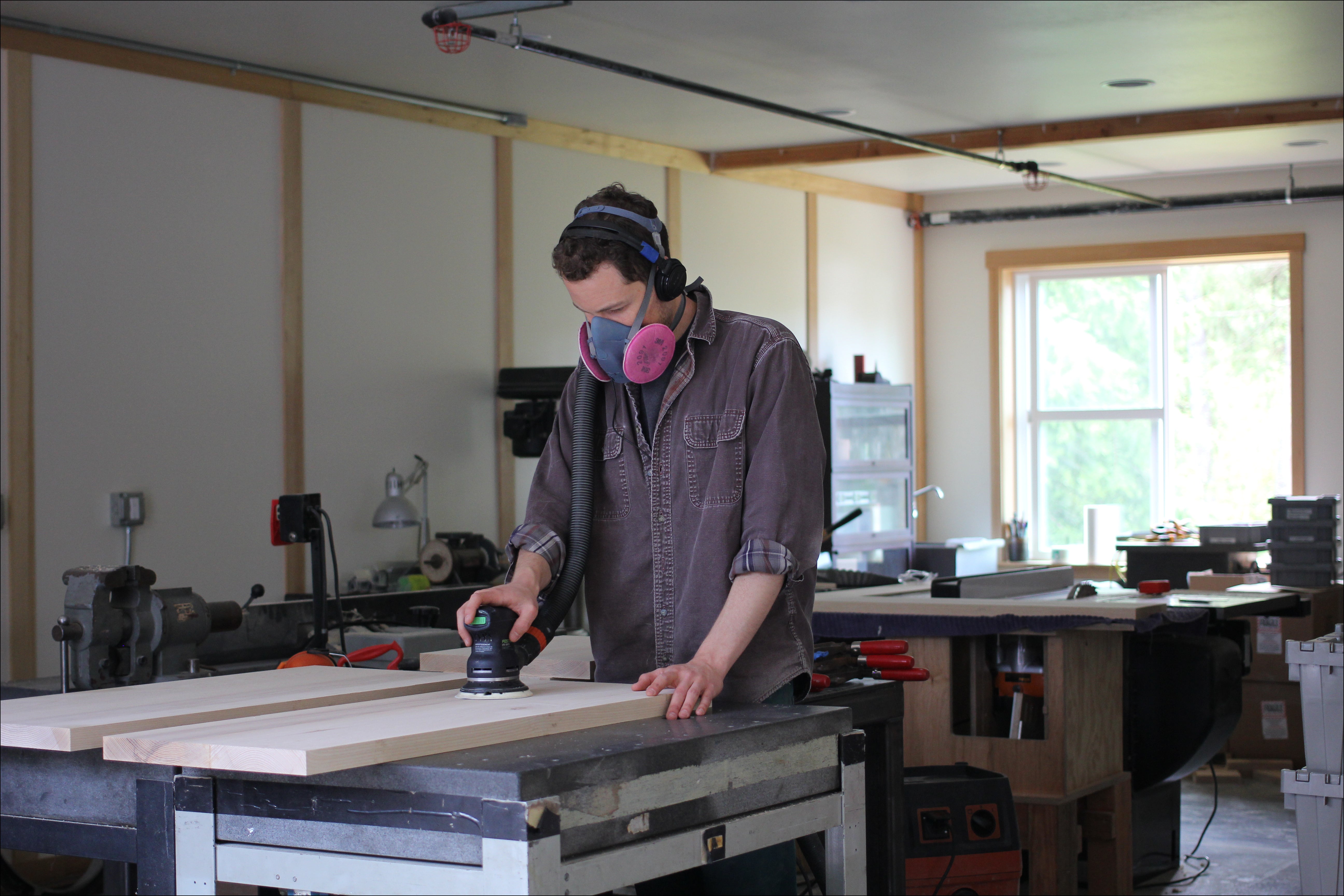 James working on woodworking projects in Grain's studio, 2016. Photo: Ben Blood