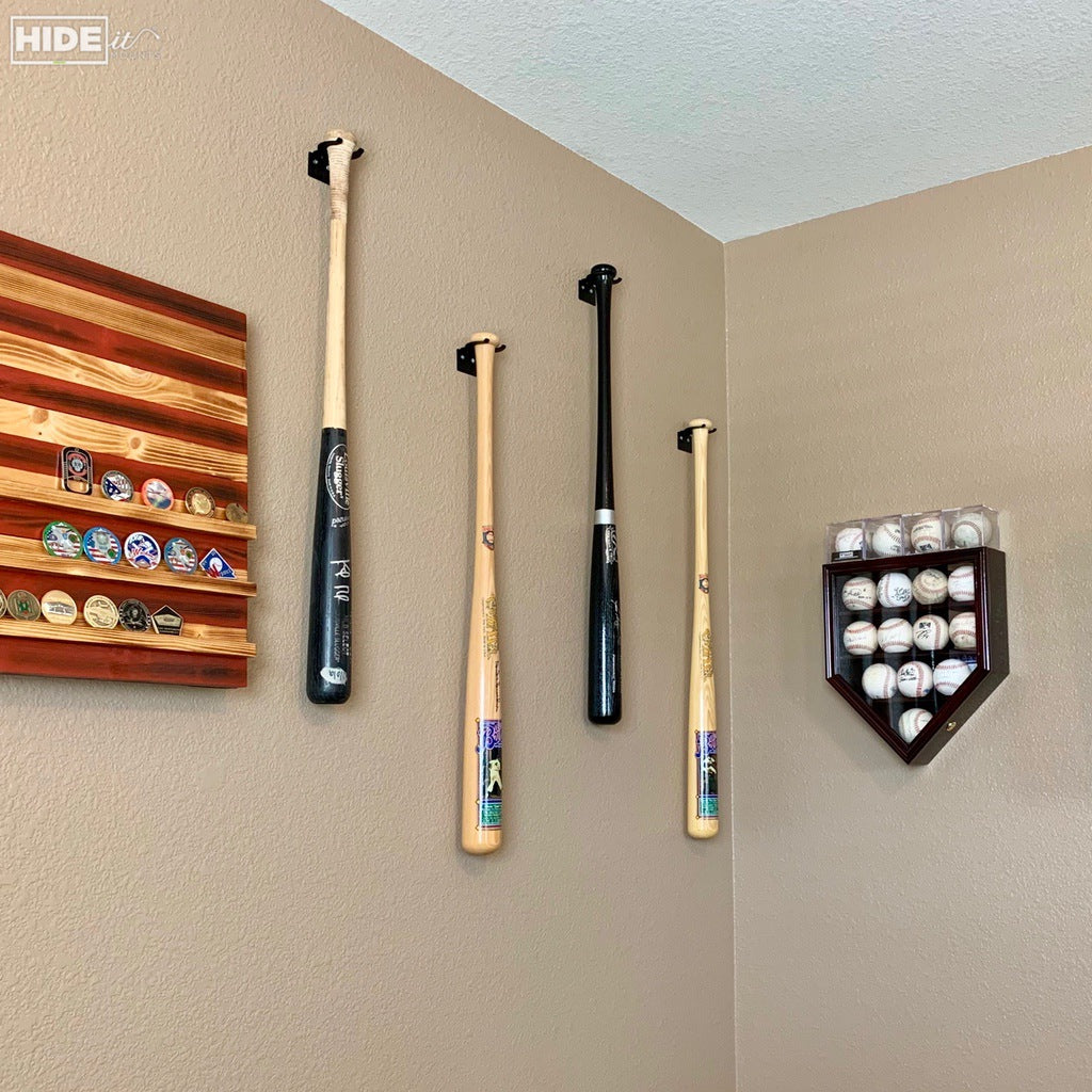 HIDEit VBat Baseball Bat Mount hanging in a room.