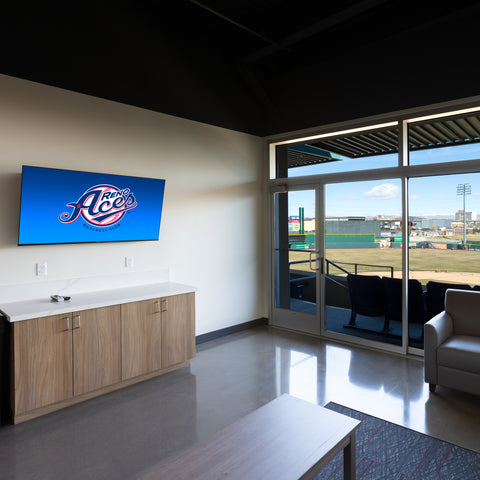 Greater Nevada Field Ball Park Suite clutter free, hidden cable box and organized space with HIDEit Mounts