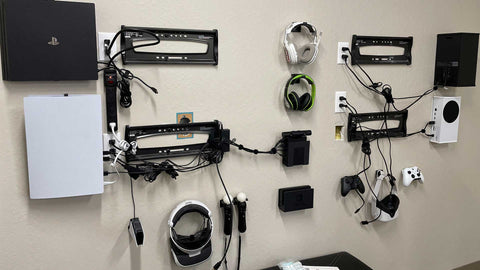 HIDEit HQ Gamer Wall. Cords with cord wraps and hiding cables behind the TVs