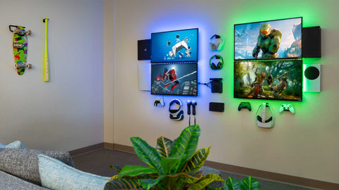HIDEit HQ Gamer Wall finished with cords hiding behind the TVs