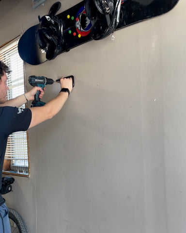 Dustyn installing snowboard mount and hockey stick mount