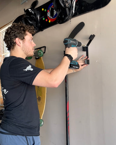 Dustyn installing vertical skateboard mount and hockey stick mount