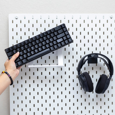 The HIDEit Keyboard Mount can be installed on a pegboard. 