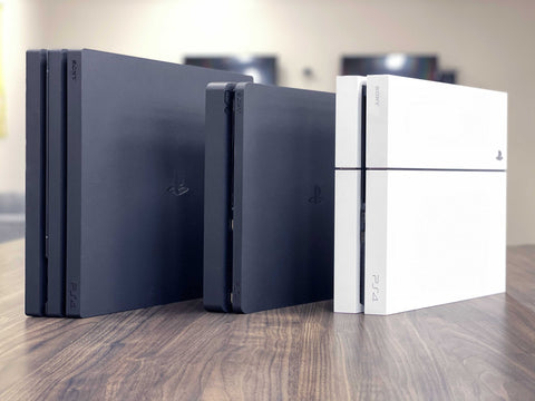 PlayStation 4 family of consoles standing