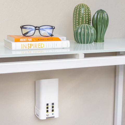 HIDEit Mounts XB7 Router mounted under a desk