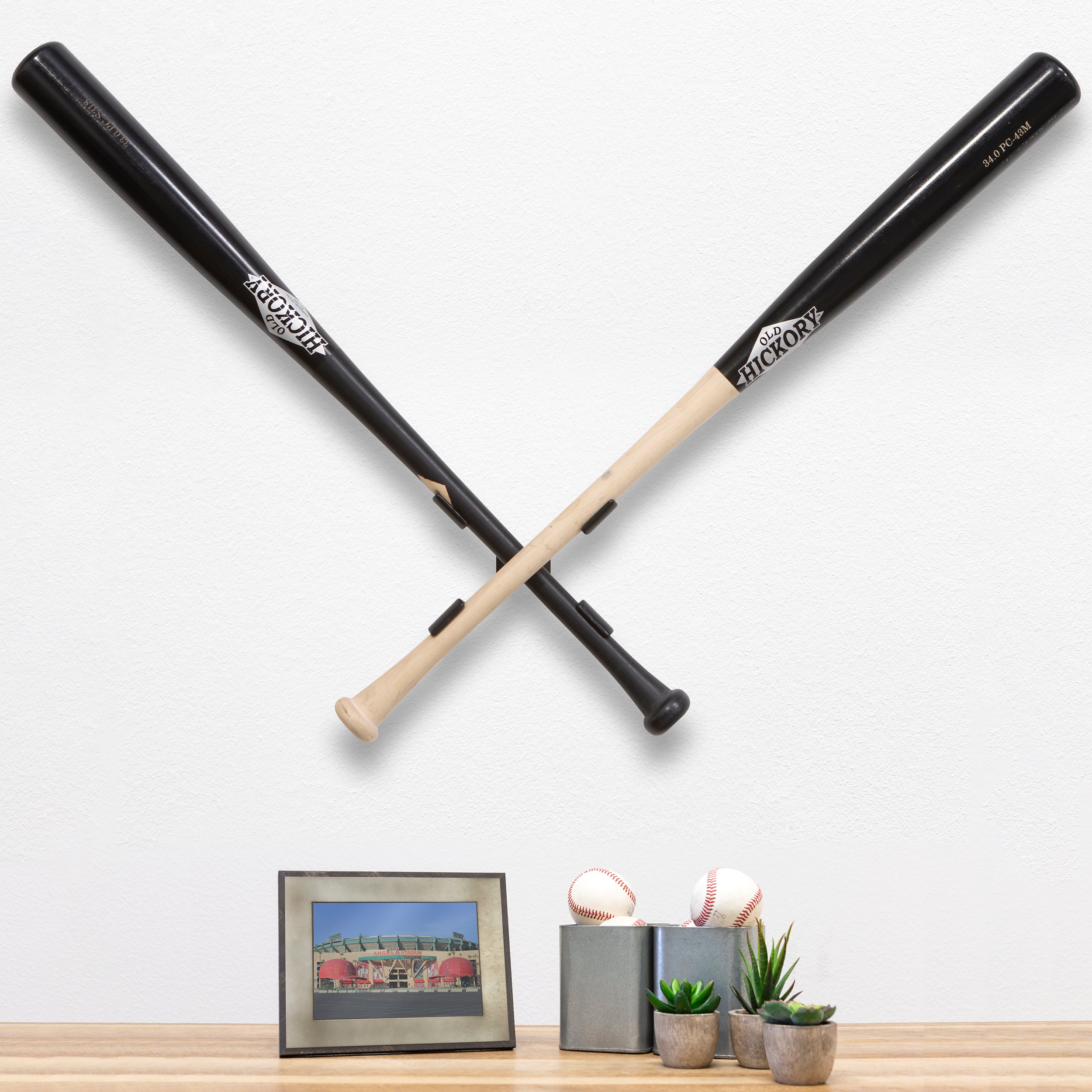 HIDEit XBat Crossed Baseball Bat Mount in a room.